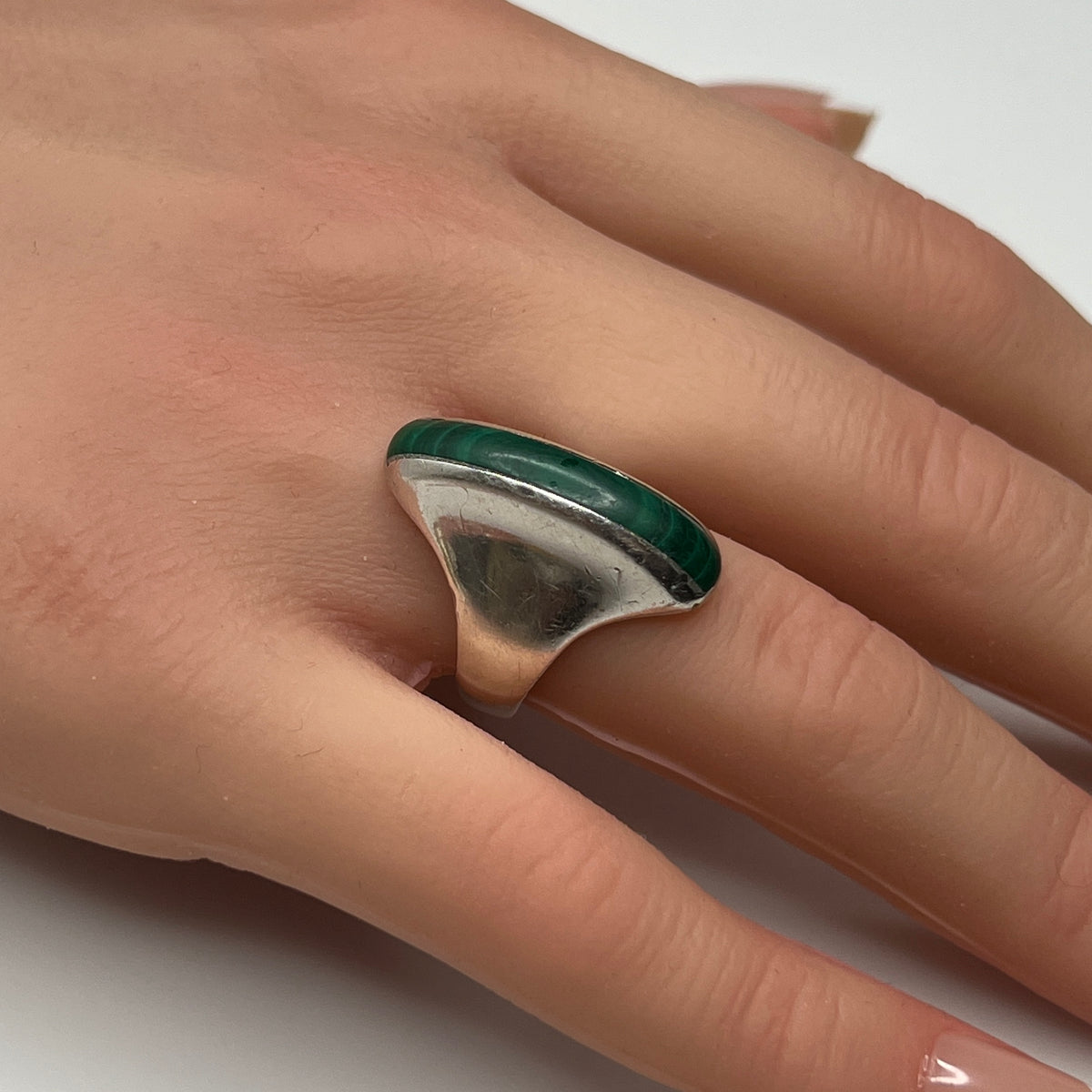 Side view of sculptural 1970s malachite and silver modernist ring