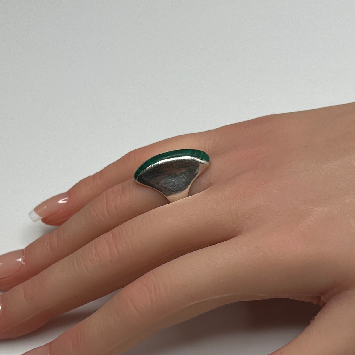 Side view of sculptural 1970s malachite and silver modernist ring