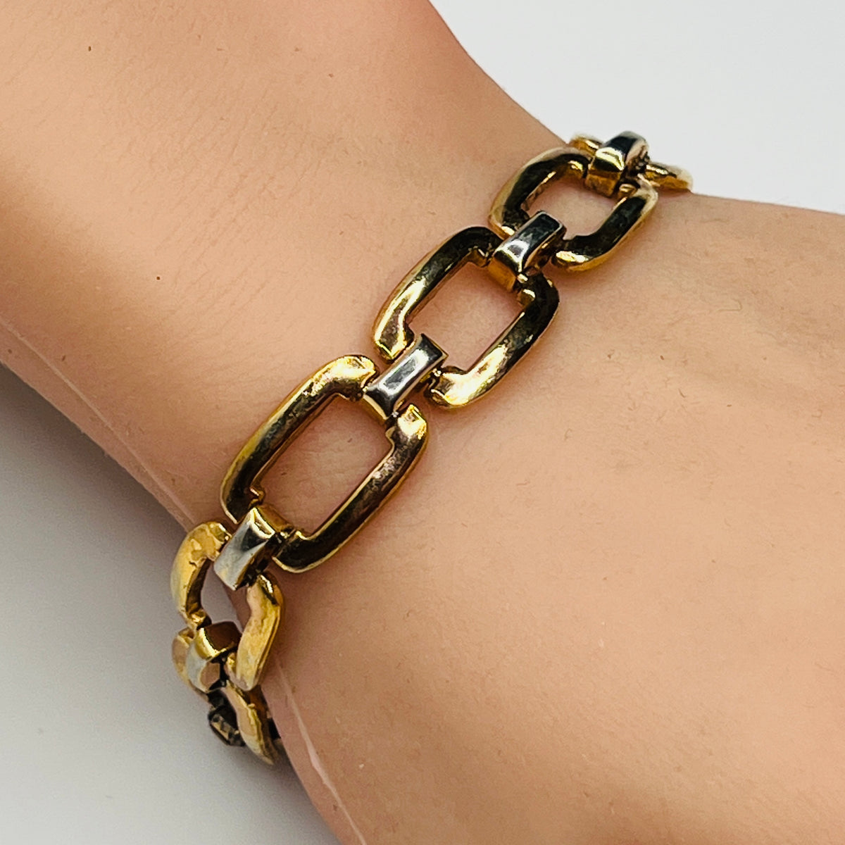 Two-tone sterling and vermeil rectangular link bracelet on wrist