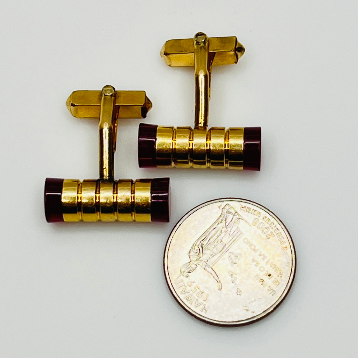 Pair of Swank gold-filled red Lucite tube cufflinks, mid-century style