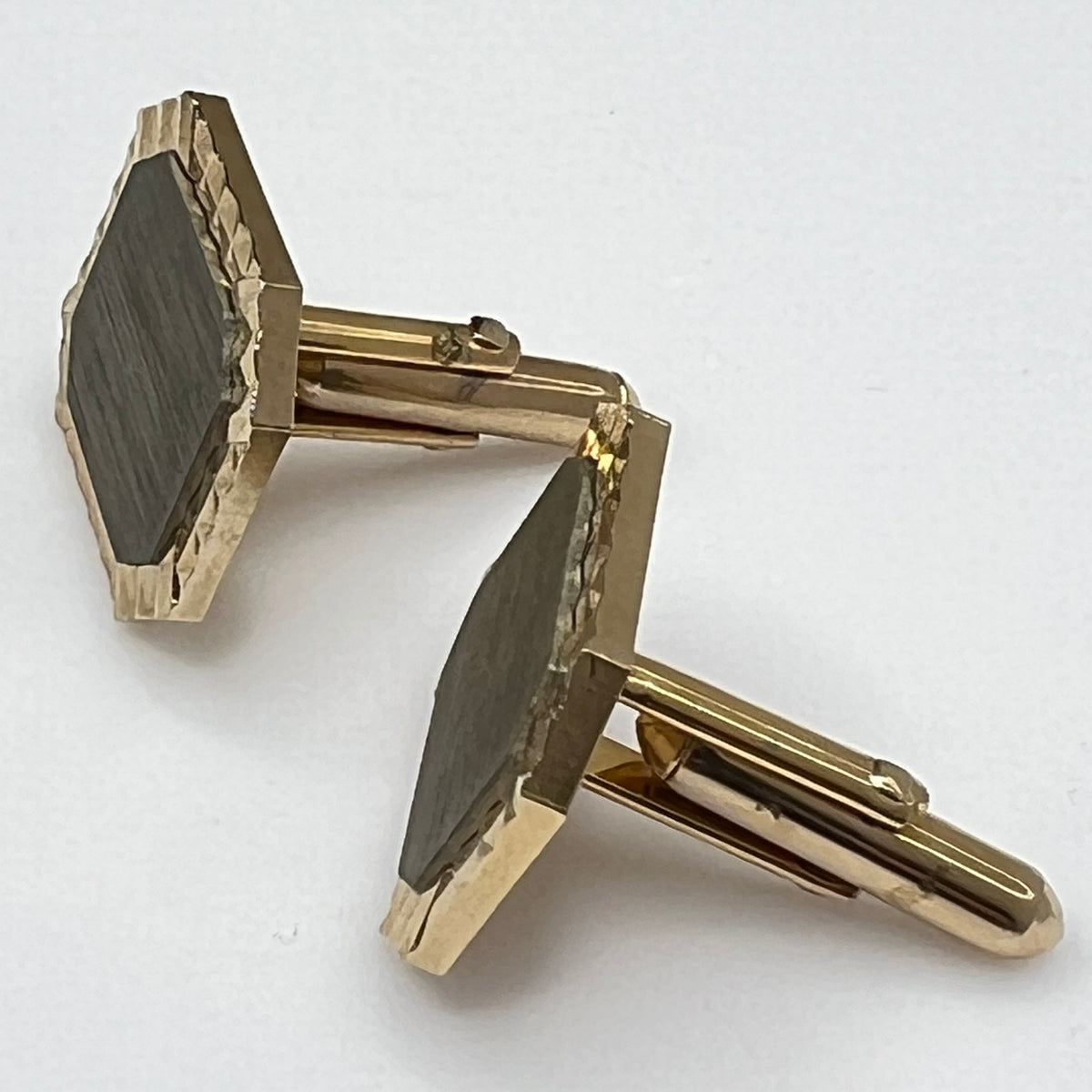 Vintage Swank gold and silver-tone cufflinks with octagonal geometric design