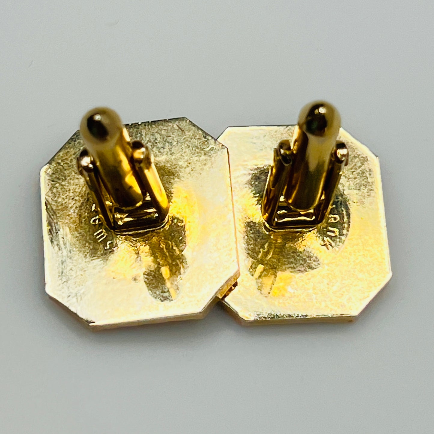 Vintage Swank gold and silver-tone cufflinks with octagonal geometric design