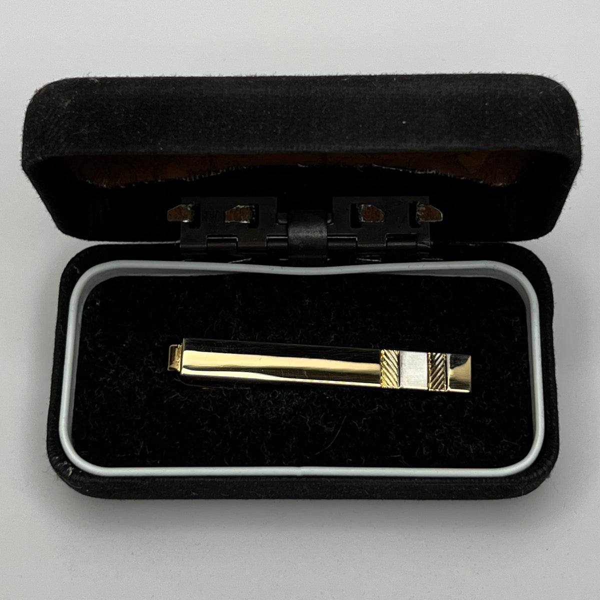 Vintage tie bar in original black velvet box (liner missing from lid)