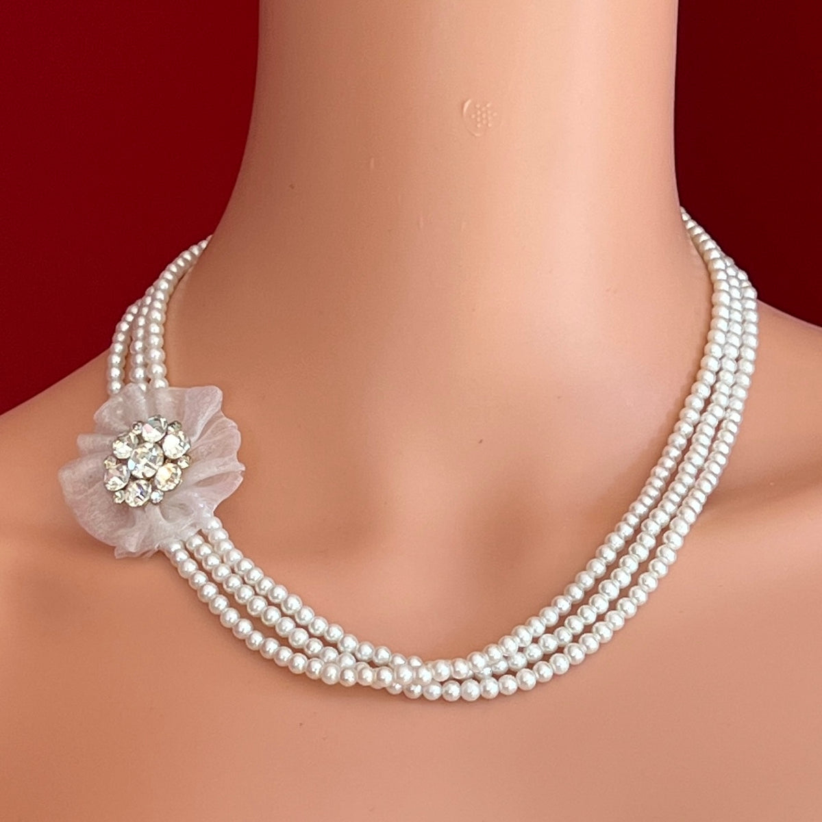 Vintage 3-strand glass pearl necklace with chiffon flower and rhinestone brooch centerpiece
