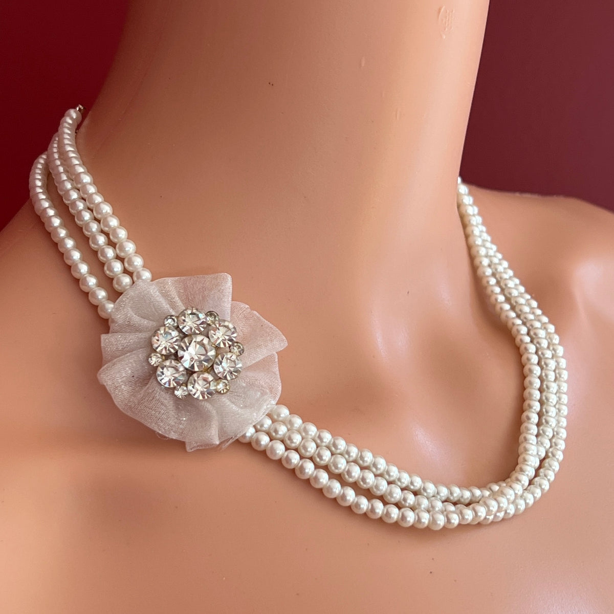 Vintage 3-strand glass pearl necklace with chiffon flower and rhinestone brooch centerpiece