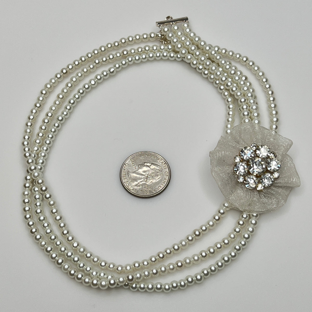 Vintage 3-strand glass pearl necklace with chiffon flower and rhinestone brooch centerpiece