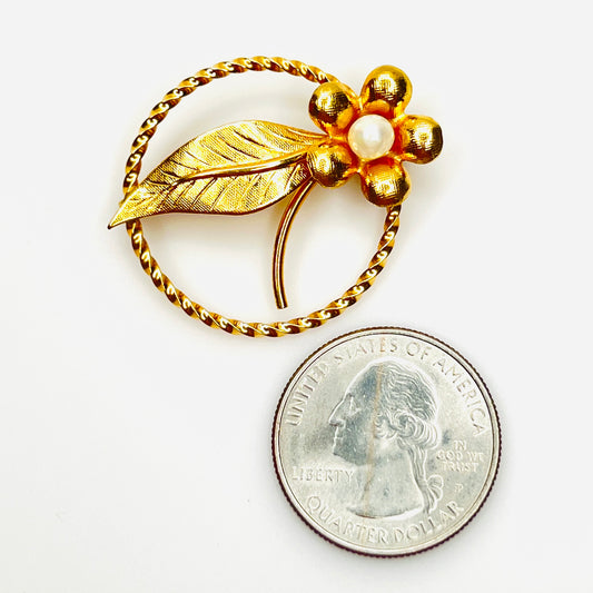 Vintage 12K gold filled pearl flower brooch shown beside quarter for scale