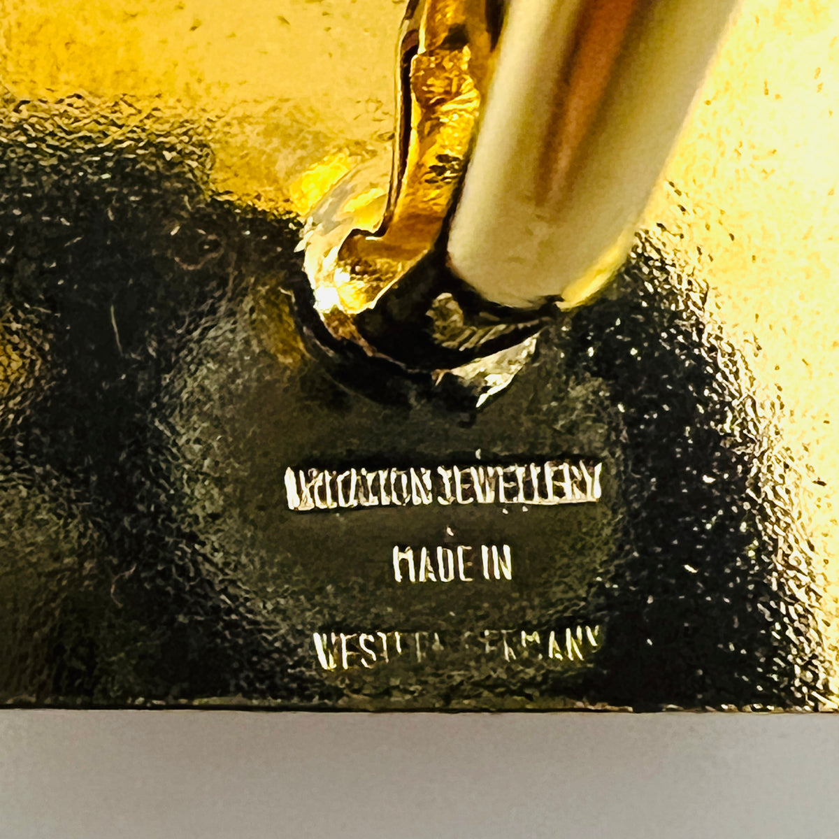 West Germany maker and origin markings stamped on reverse of vintage gold tone cufflink