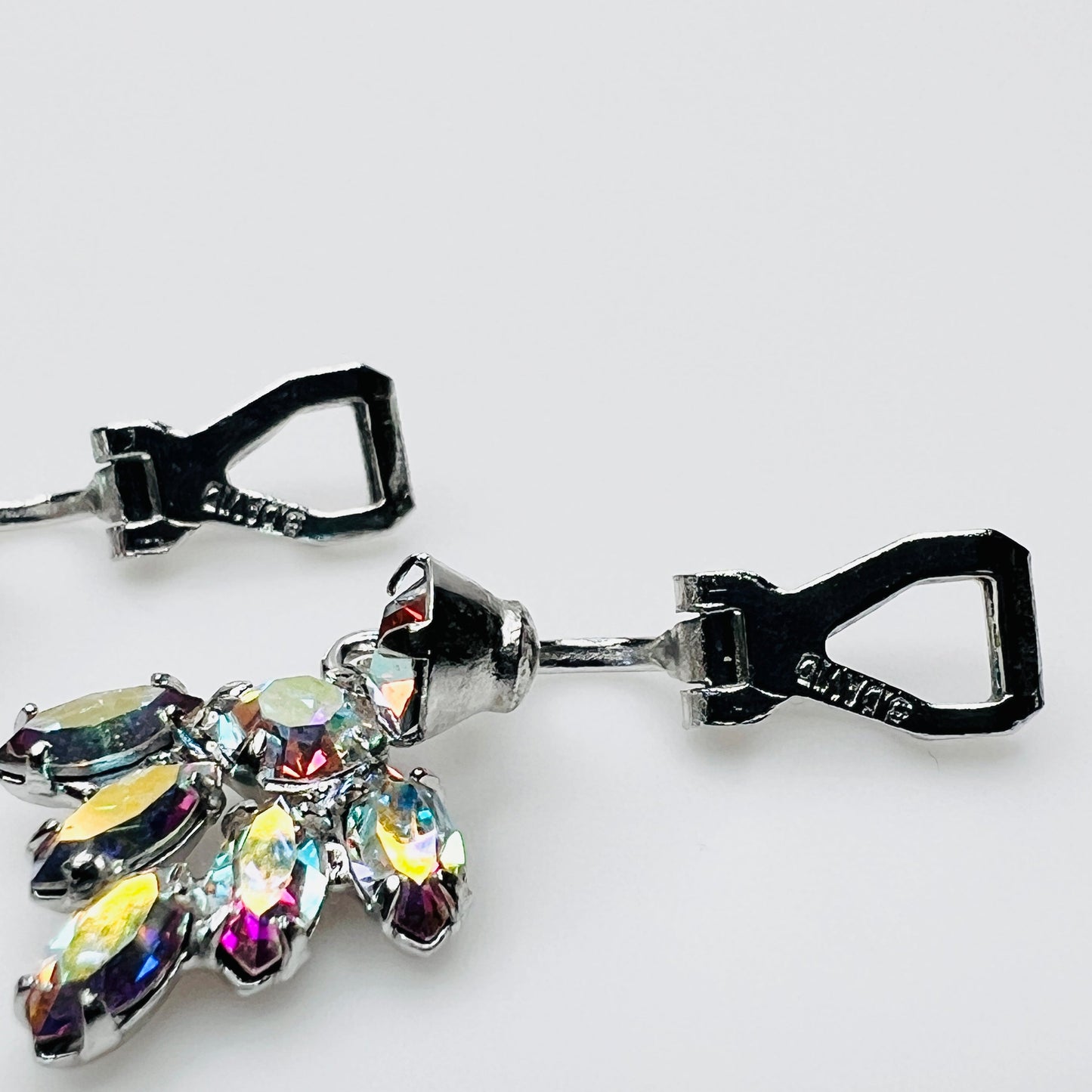 Signed B. David aurora borealis crystal earrings close-up