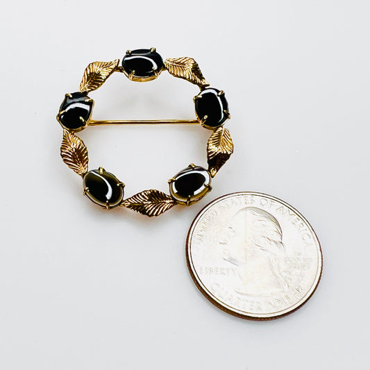 12K gold filled wreath brooch with black glass stones size reference