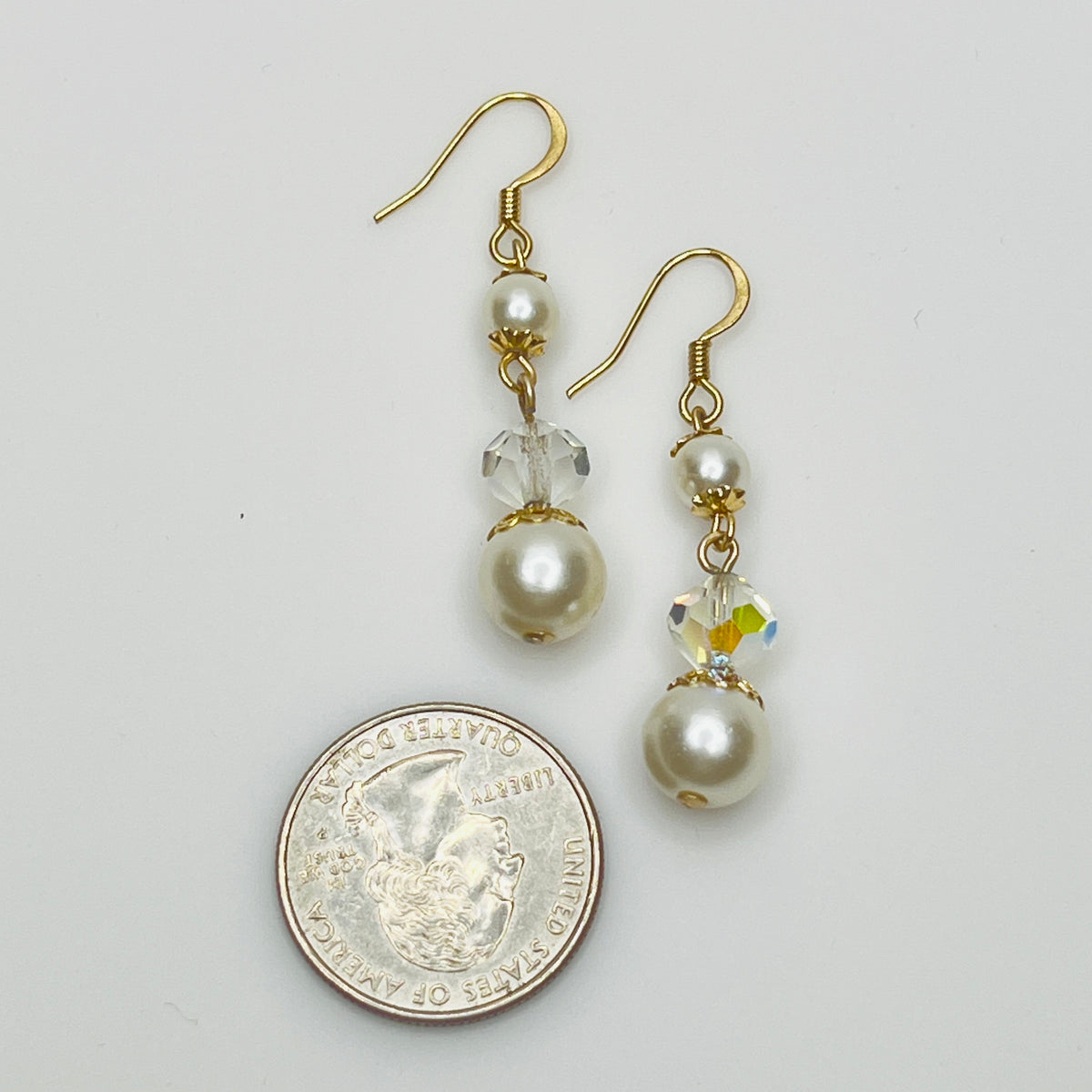 Gold-tone dangle earrings with faux pearls and faceted aurora borealis crystals, vintage 1960s