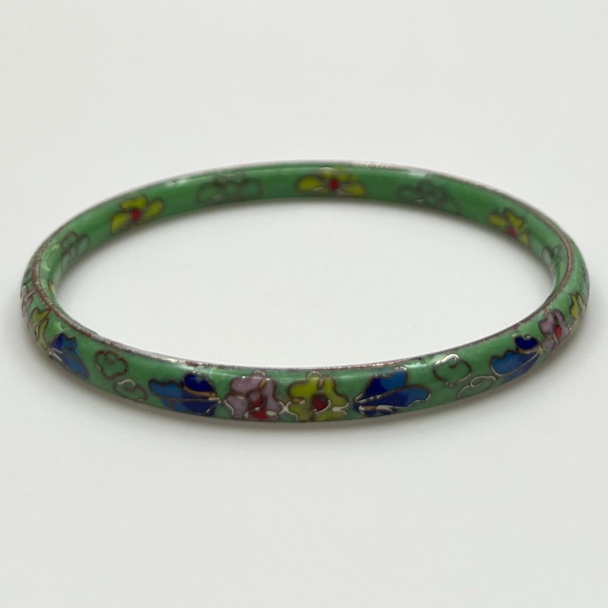 Vintage green cloisonne enamel bangle with colorful floral design