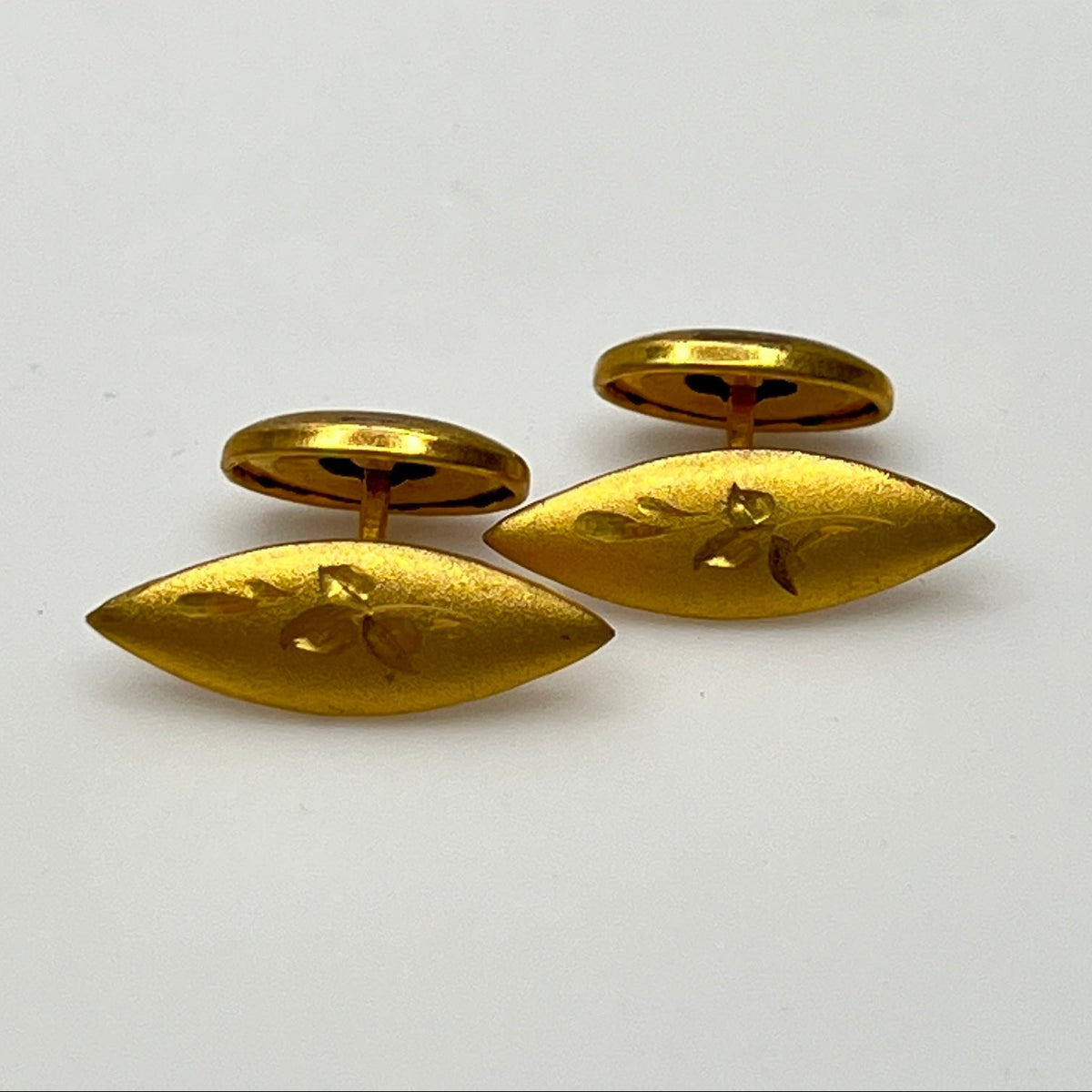Vintage gold-tone engraved double-sided cufflinks with marquise shape