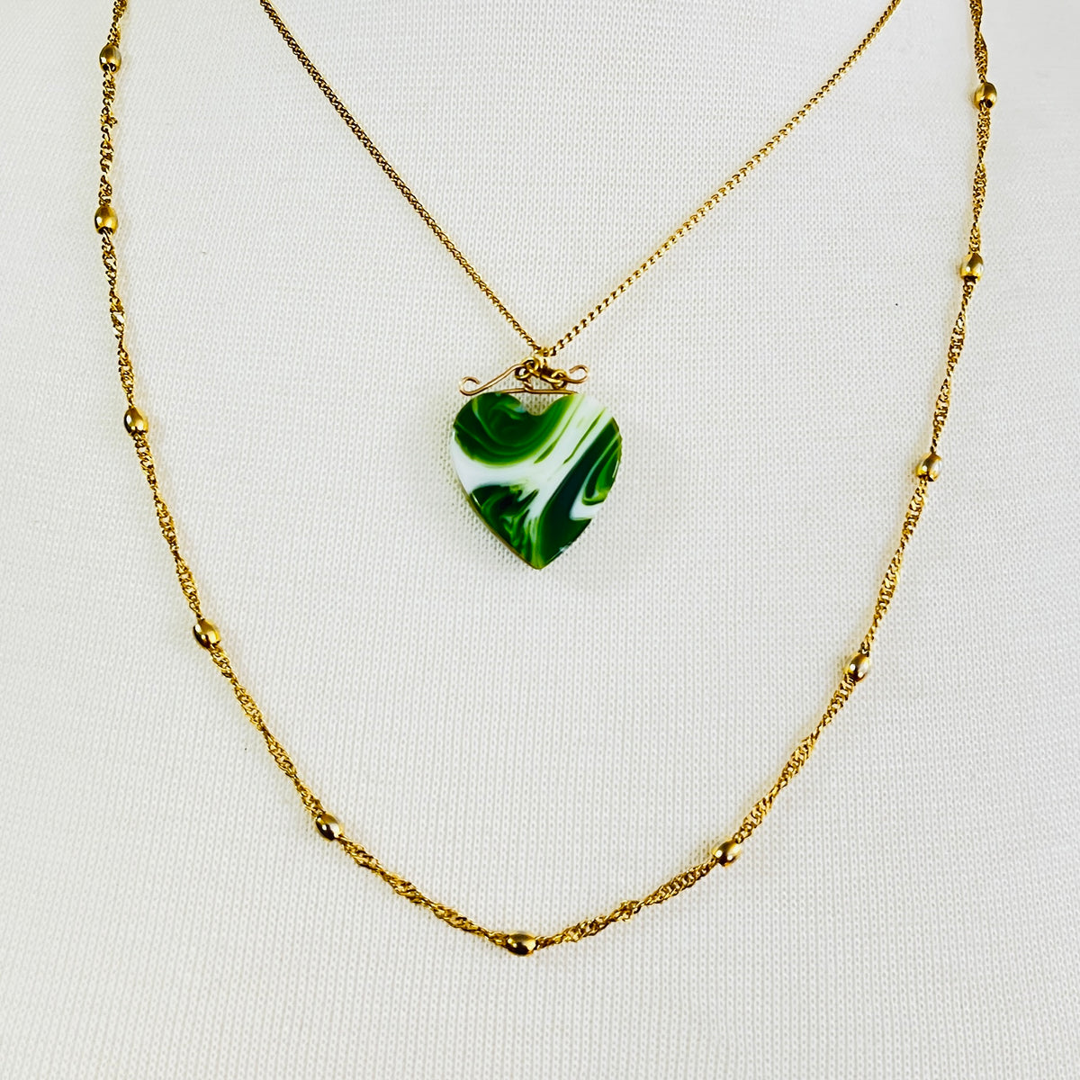 Vintage necklace set with marbled green glass heart pendant and signed Napier gold rope chain