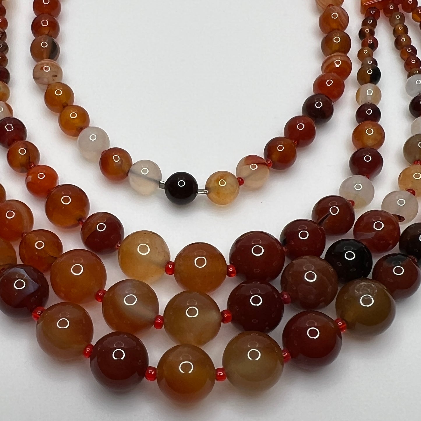 Triple strand vintage glass bead necklace in warm autumn tones
