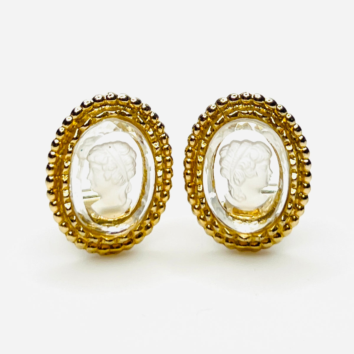 Vintage intaglio carved glass cameo clip-on earrings in gold-tone settings