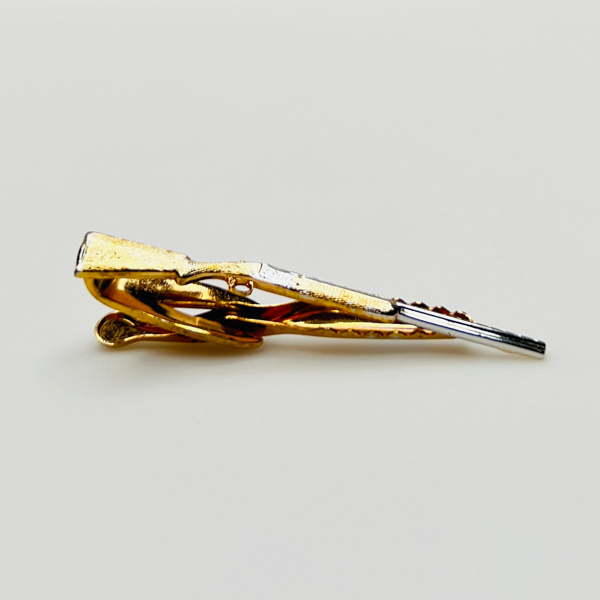 Mid Century over-under shotgun tie bar signed Hickok