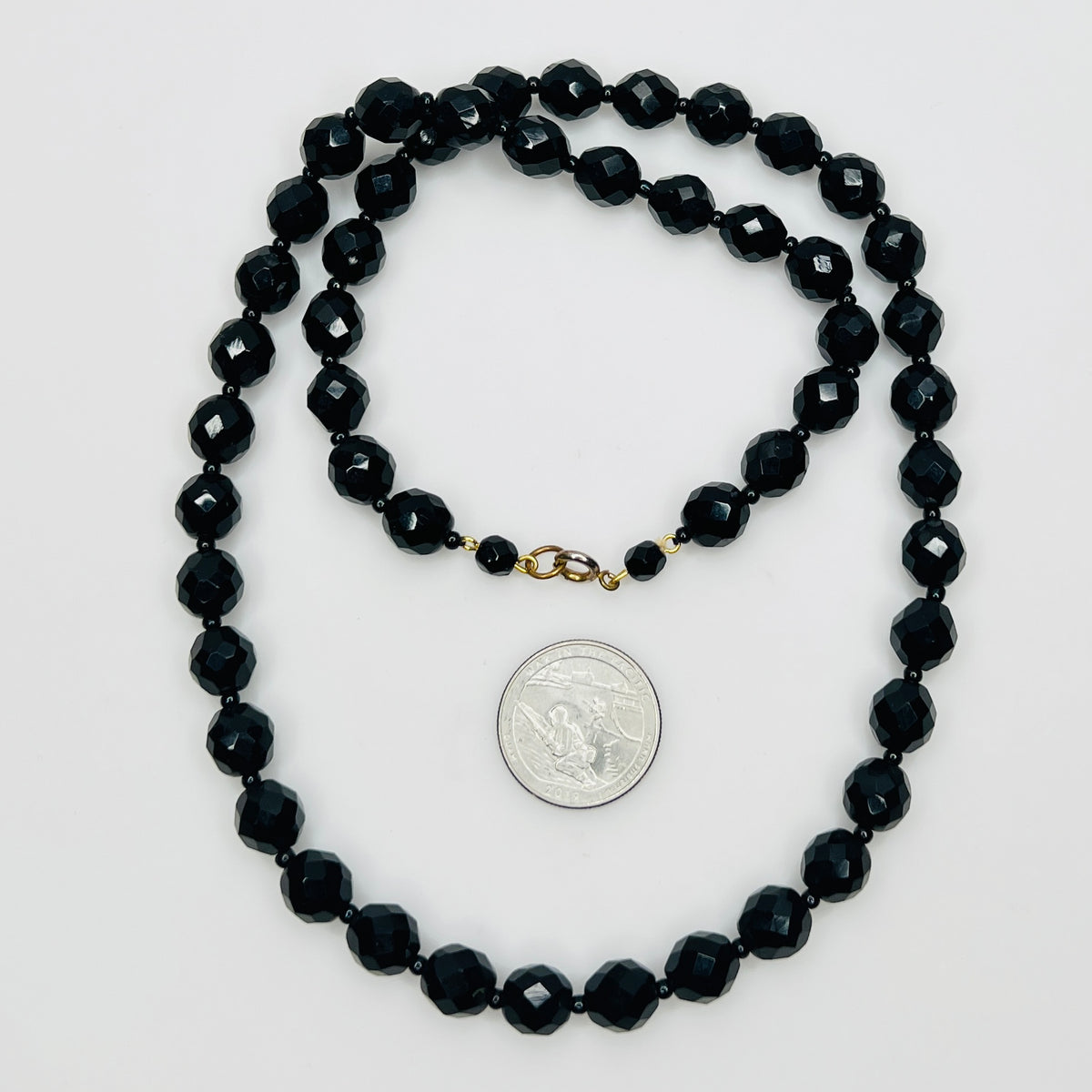 Vintage 1970s black glass bead necklace with gold tone clasp