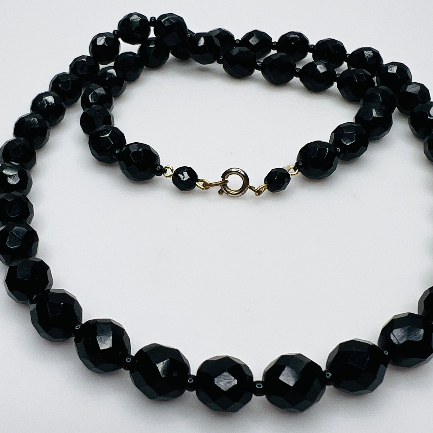 Vintage black faceted glass bead necklace strand detail