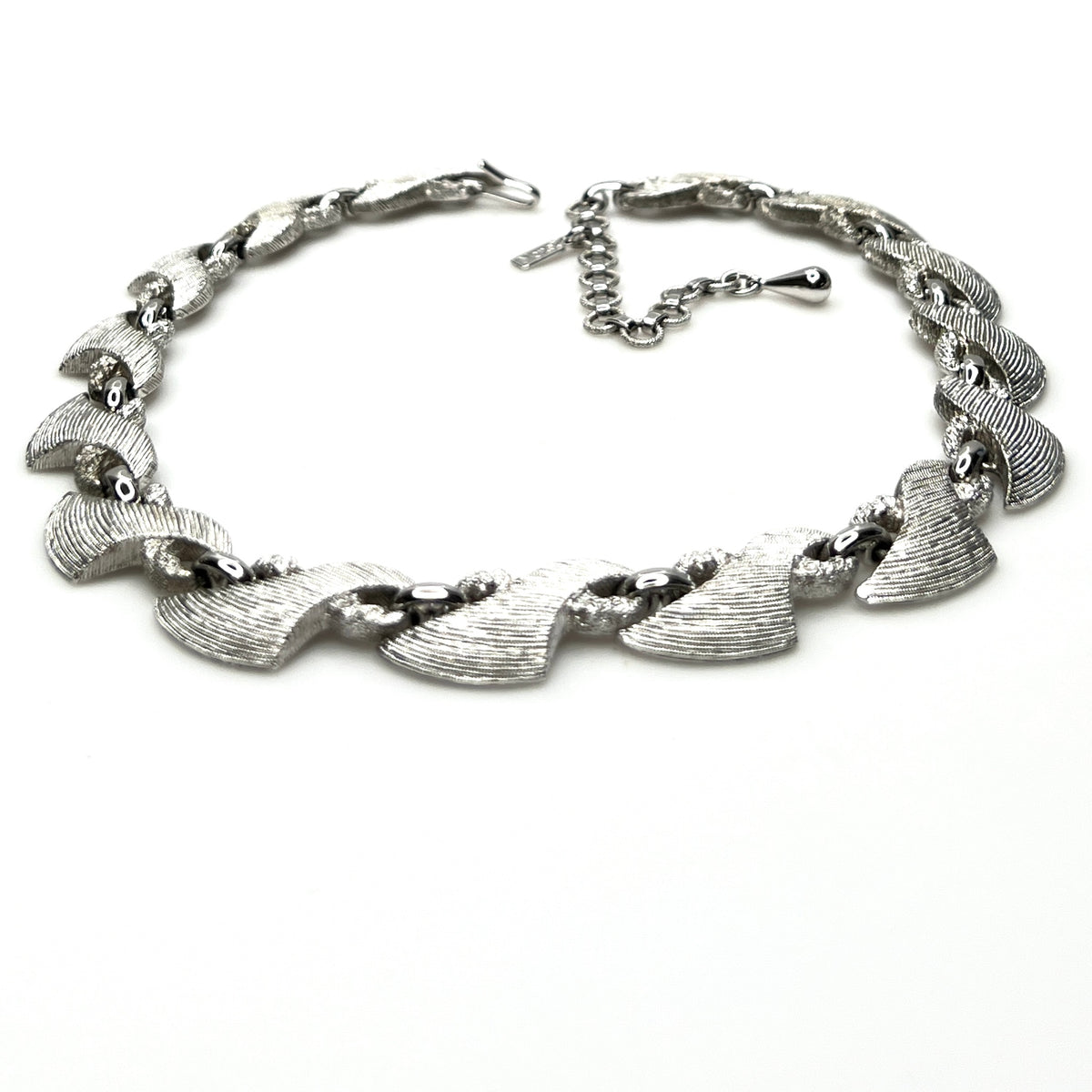 Vintage 1960s Monet textured silver tone choker with extender chain