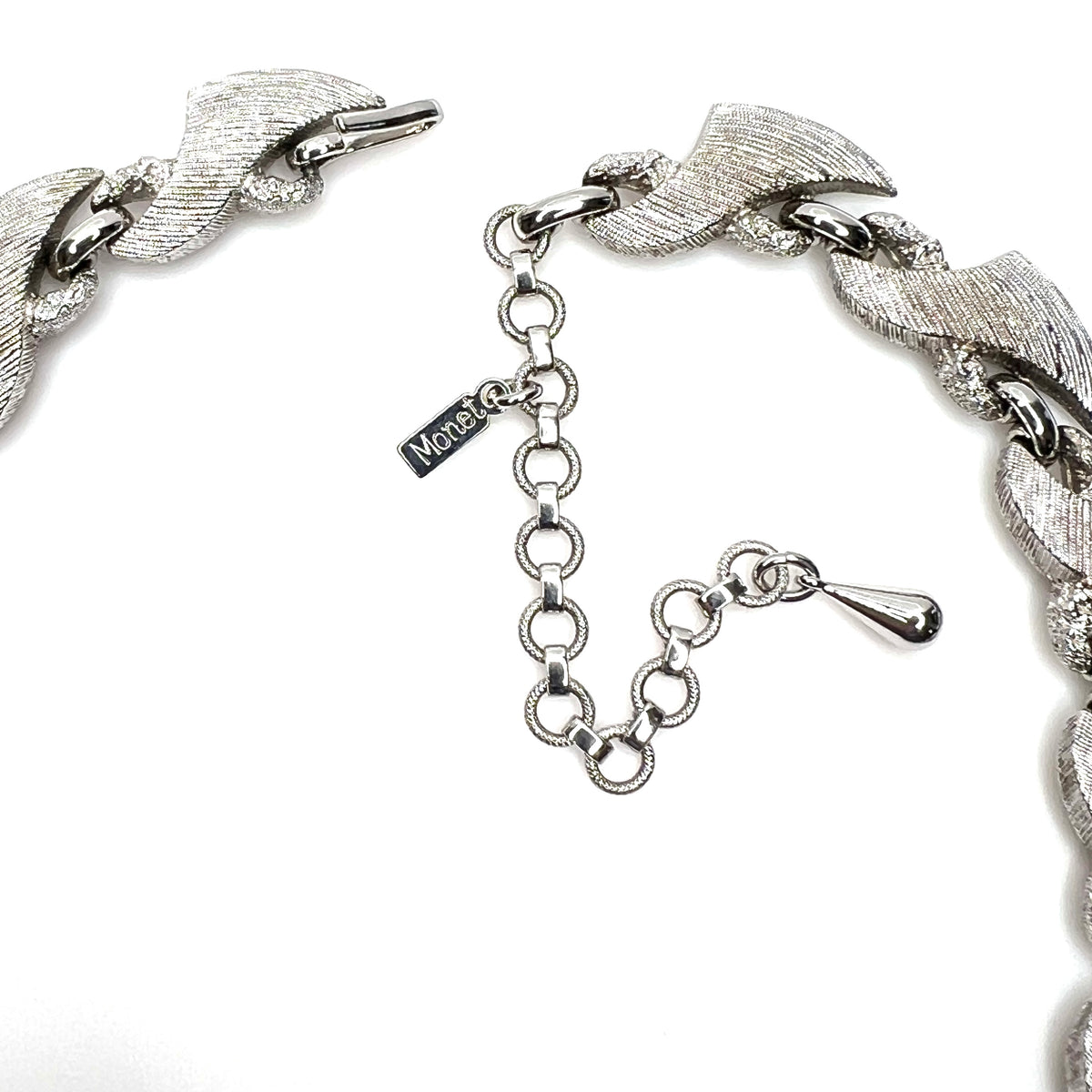 Monet hang tag and adjustable extender chain detail on vintage necklace