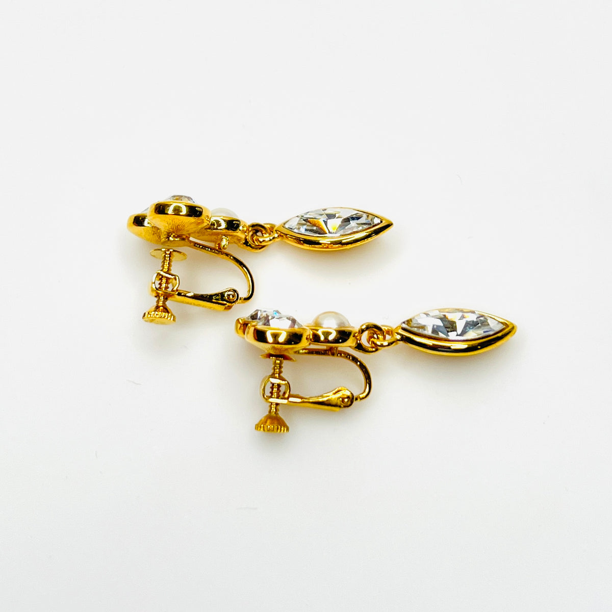 Side view of vintage Napier adjustable clip-on rhinestone earrings