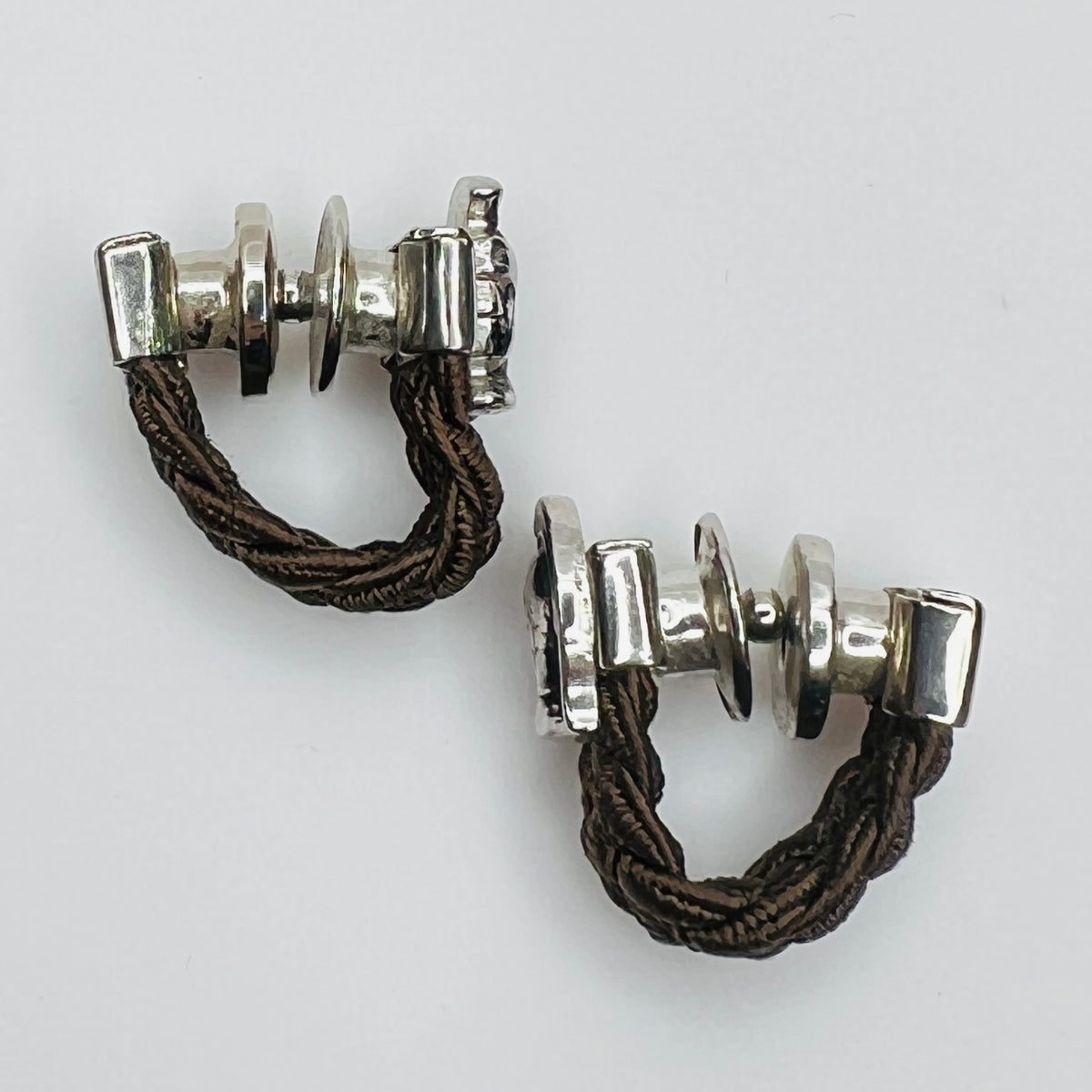 Side view wraparound cufflinks snap closure detail