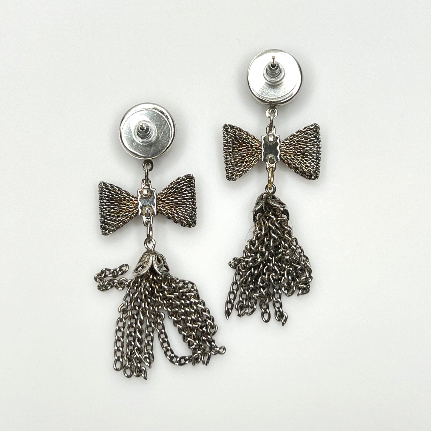 Back view of vintage silver tone tassel earrings with stabilizer push backs
