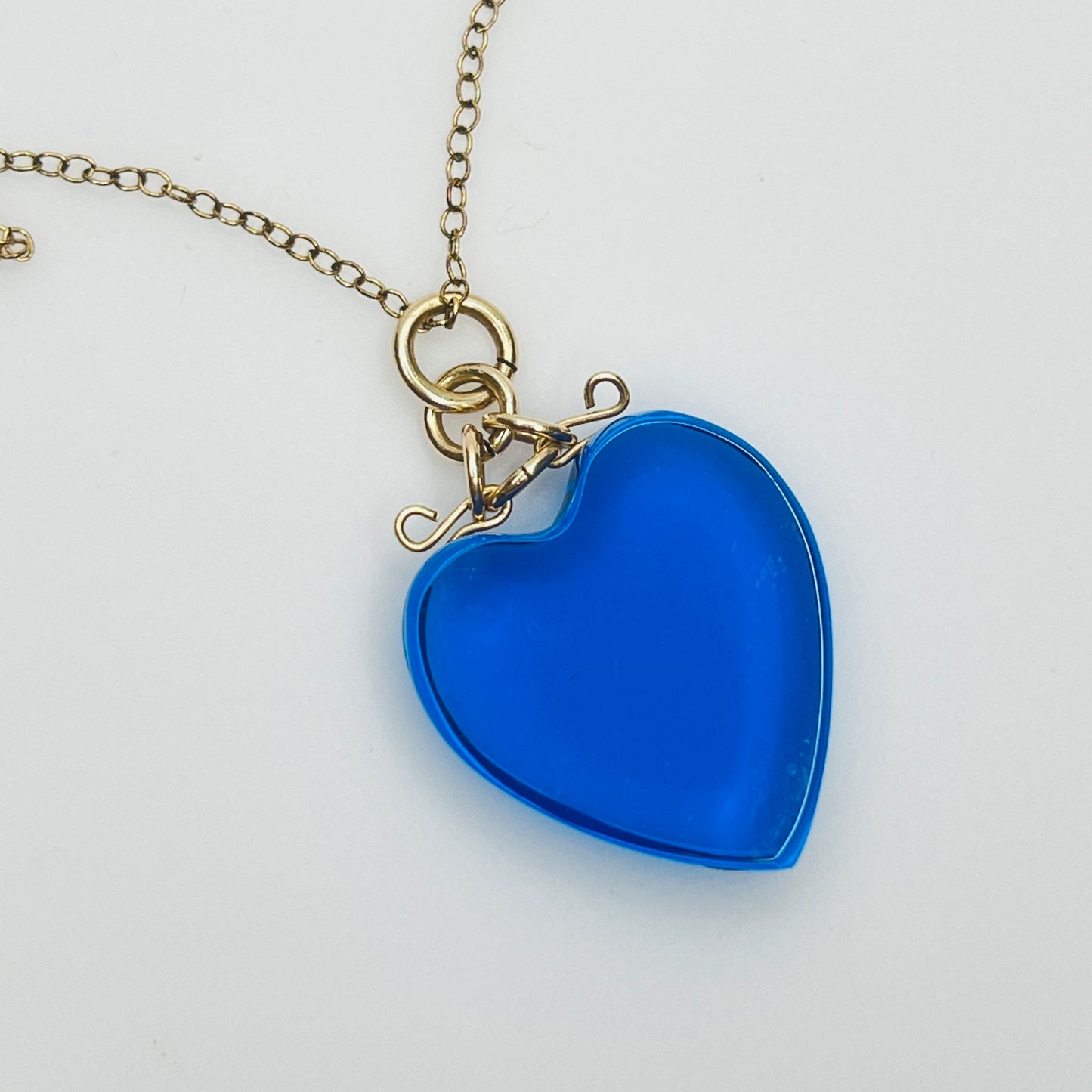 Close-up of blue crystal heart and 12K gold filled clasp