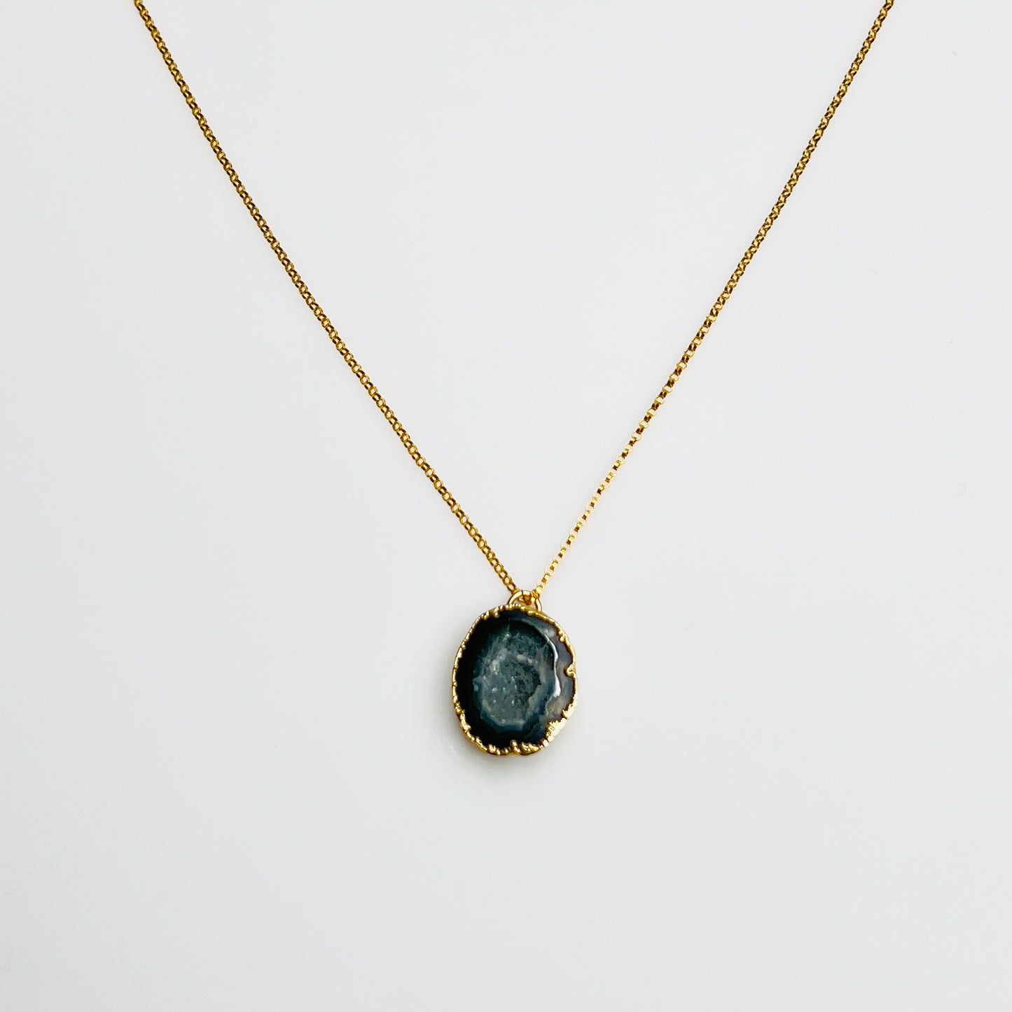 Gold filled necklace with black agate geode pendant