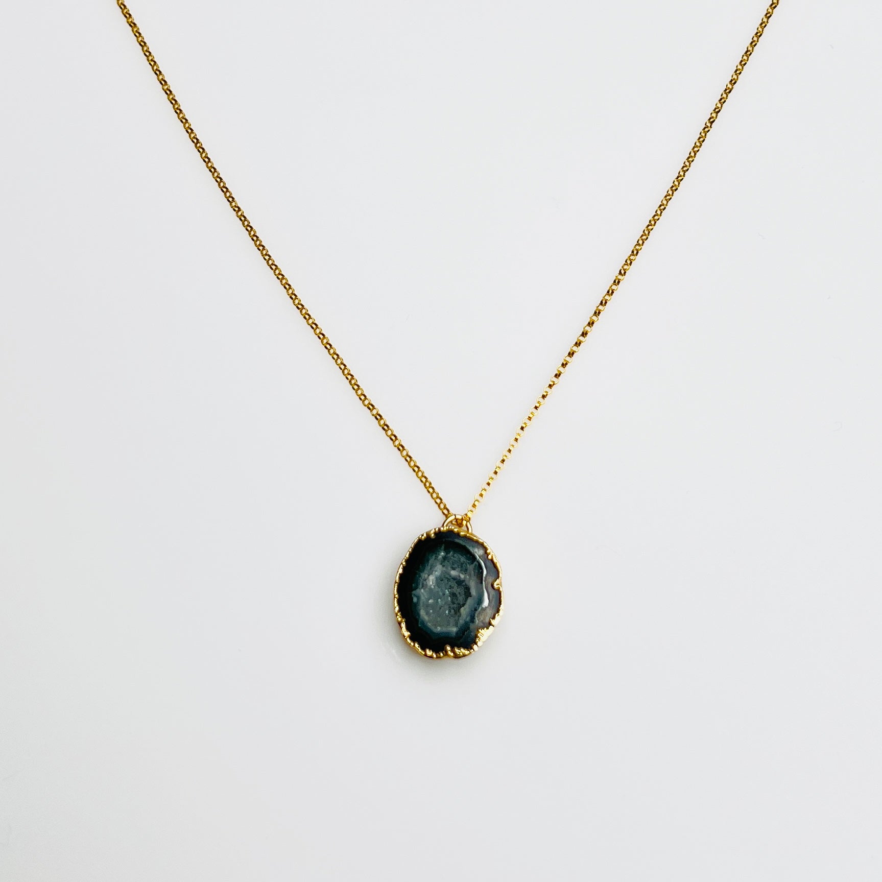 Gold filled necklace with black agate geode pendant