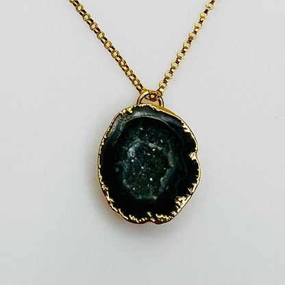 Gold filled necklace with black agate geode slice pendant