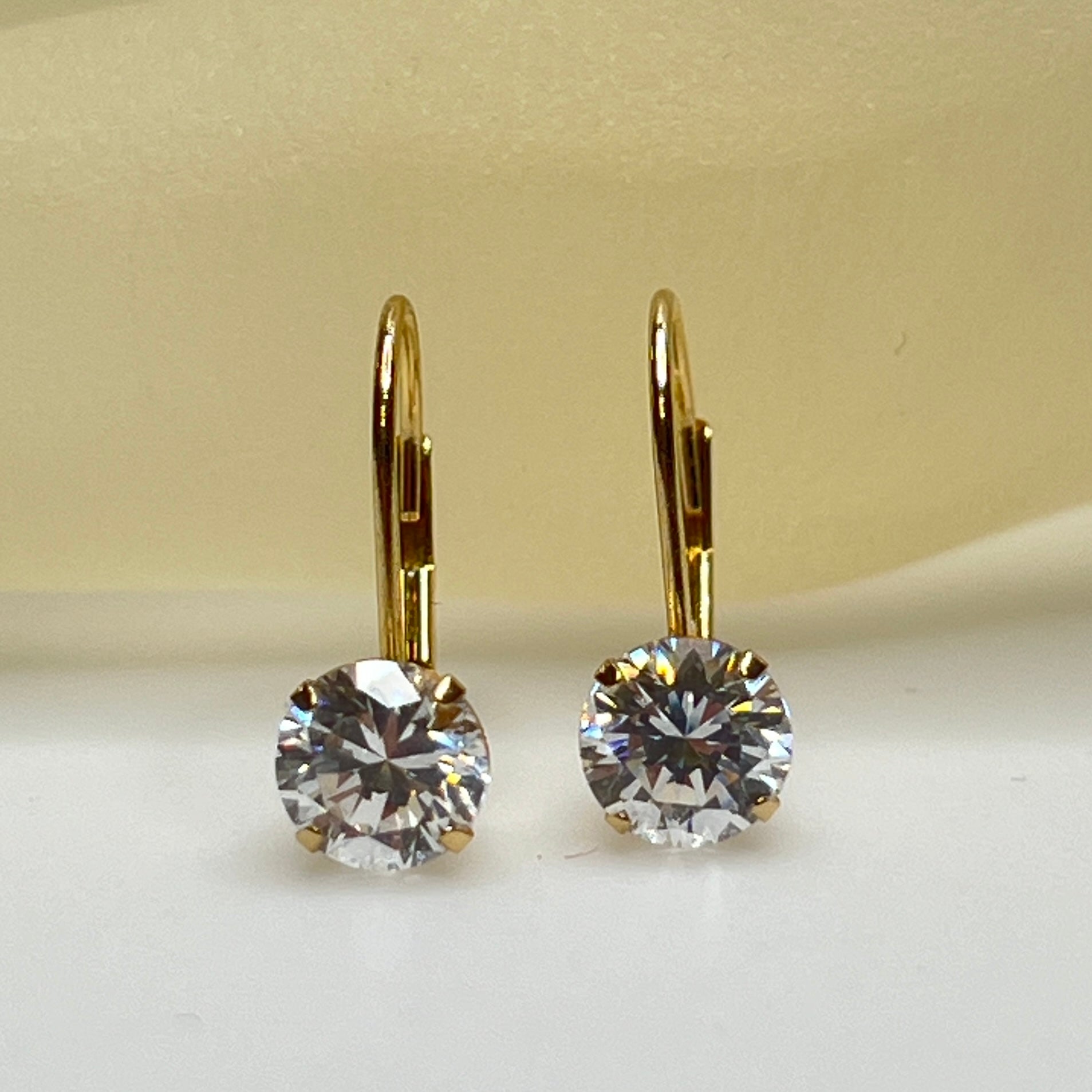 14K yellow gold leverback earrings with clear solitaire CZ stones