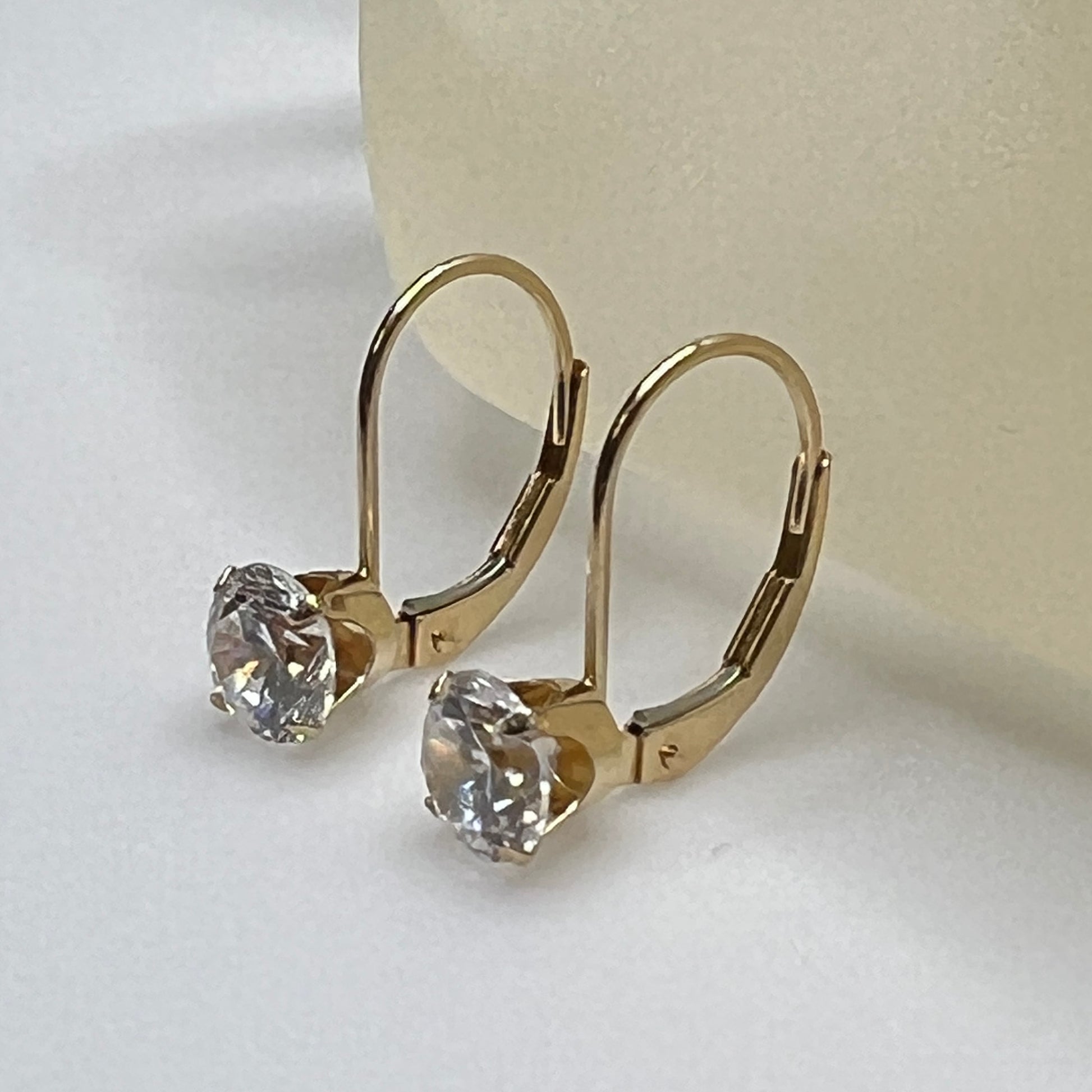 14K yellow gold leverback earrings with clear solitaire CZ stones