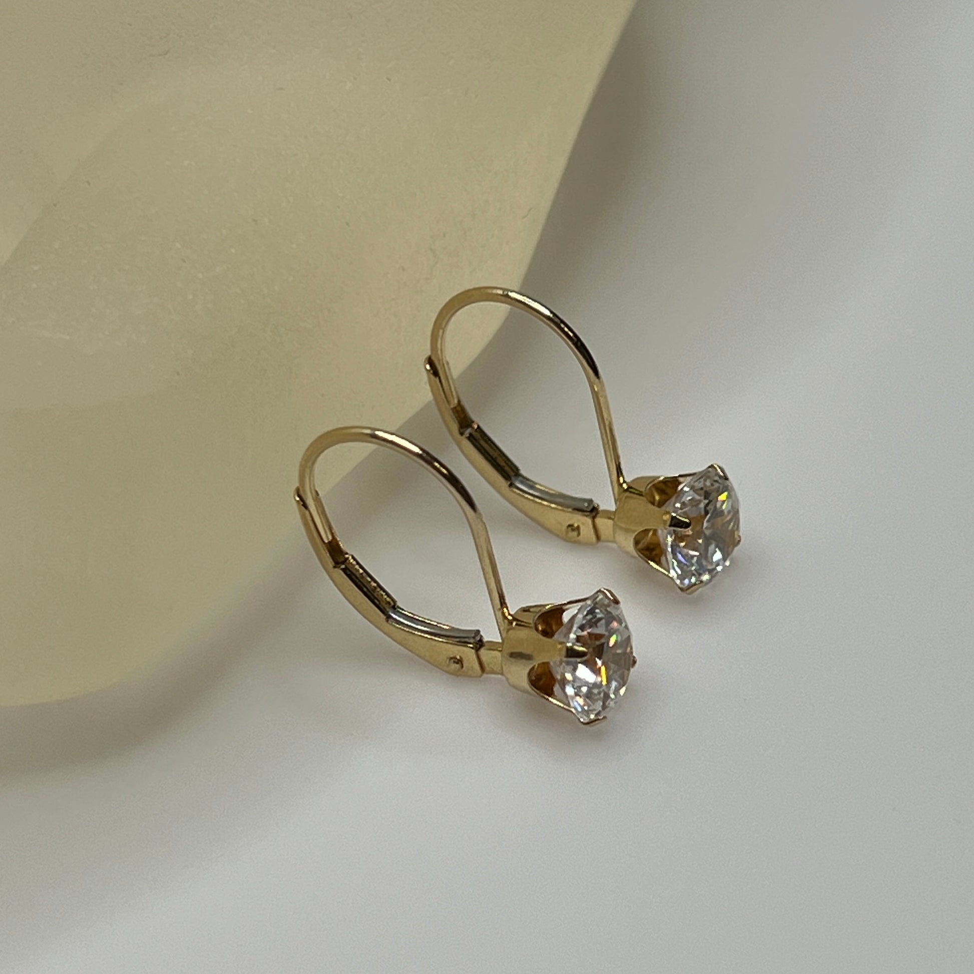 14K yellow gold leverback earrings with clear solitaire CZ stones