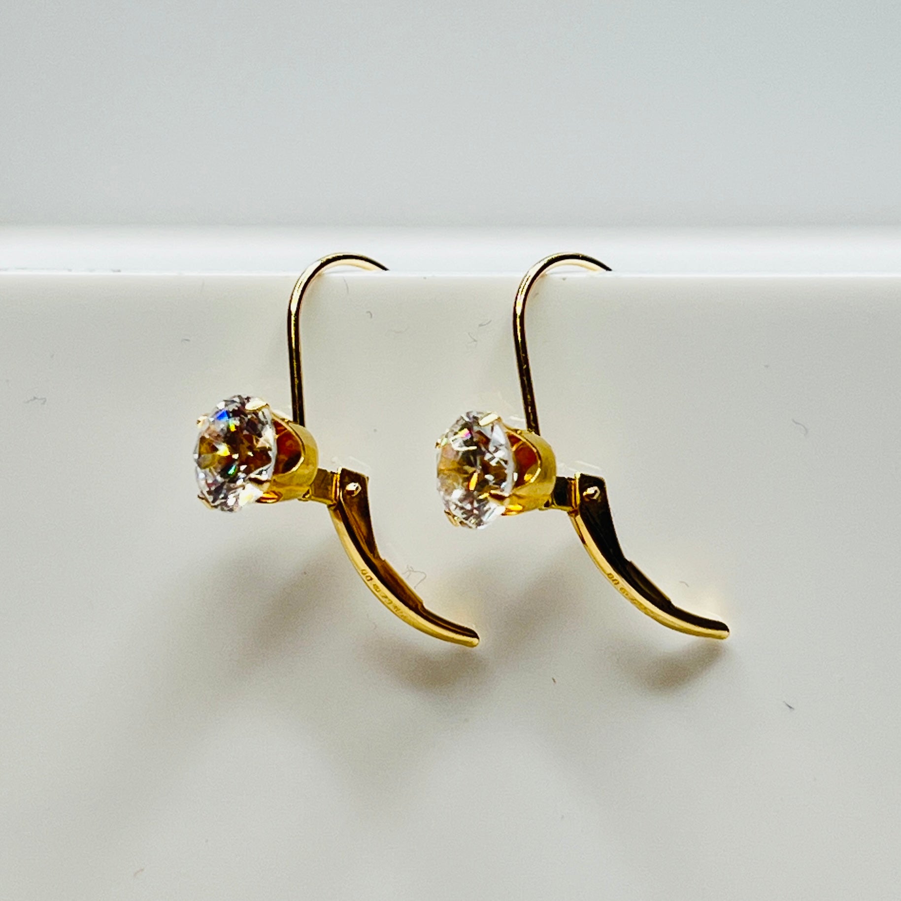 14K yellow gold leverback earrings with clear solitaire CZ stones