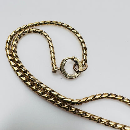 Close-up of gold filled chain and spring ring clasp