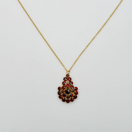 Close up prong set ruby red Czech glass cluster pendant