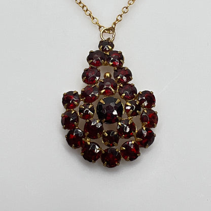 Close up prong set ruby red Czech glass cluster pendant
