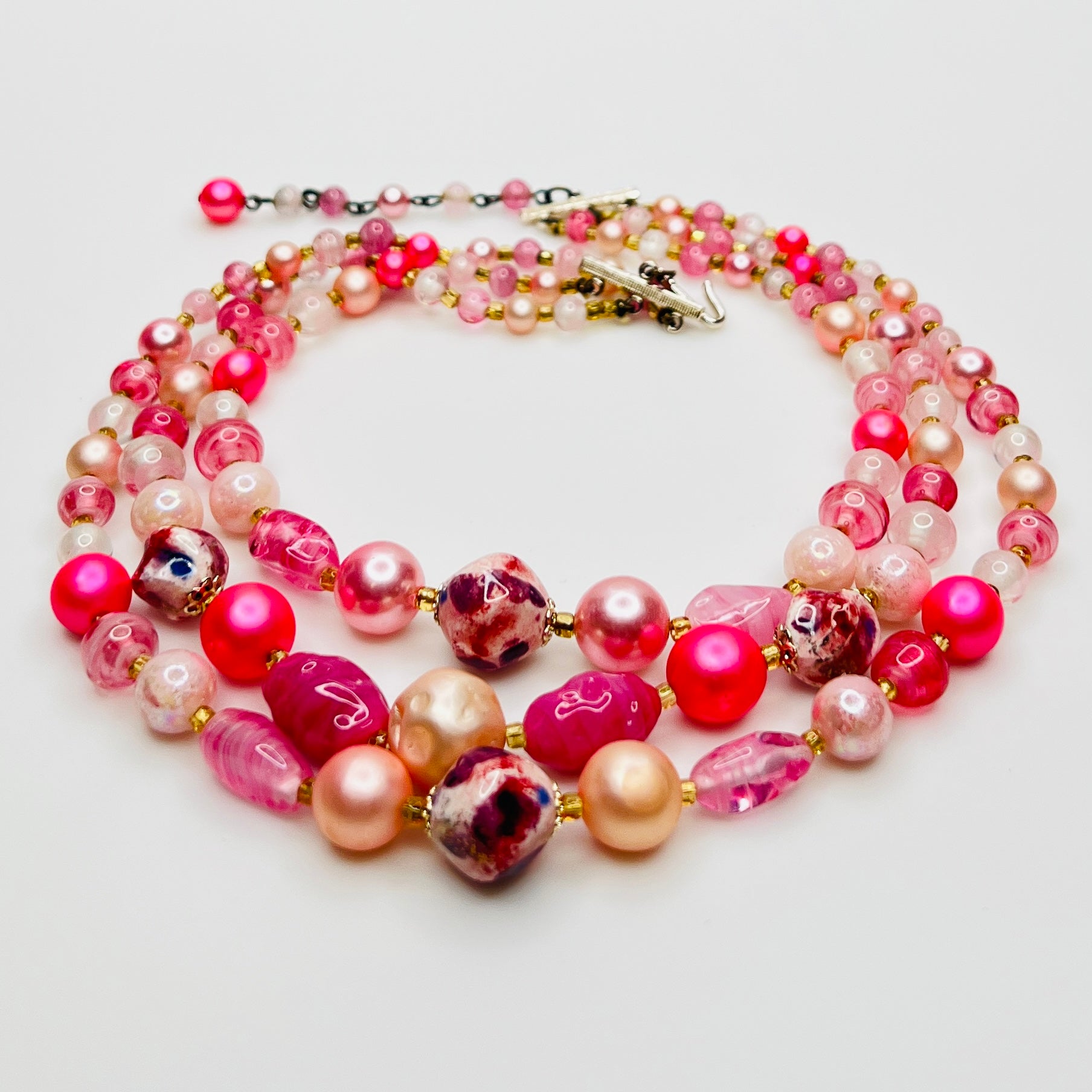 Mixed pink glass and pearl beads multi strand necklace