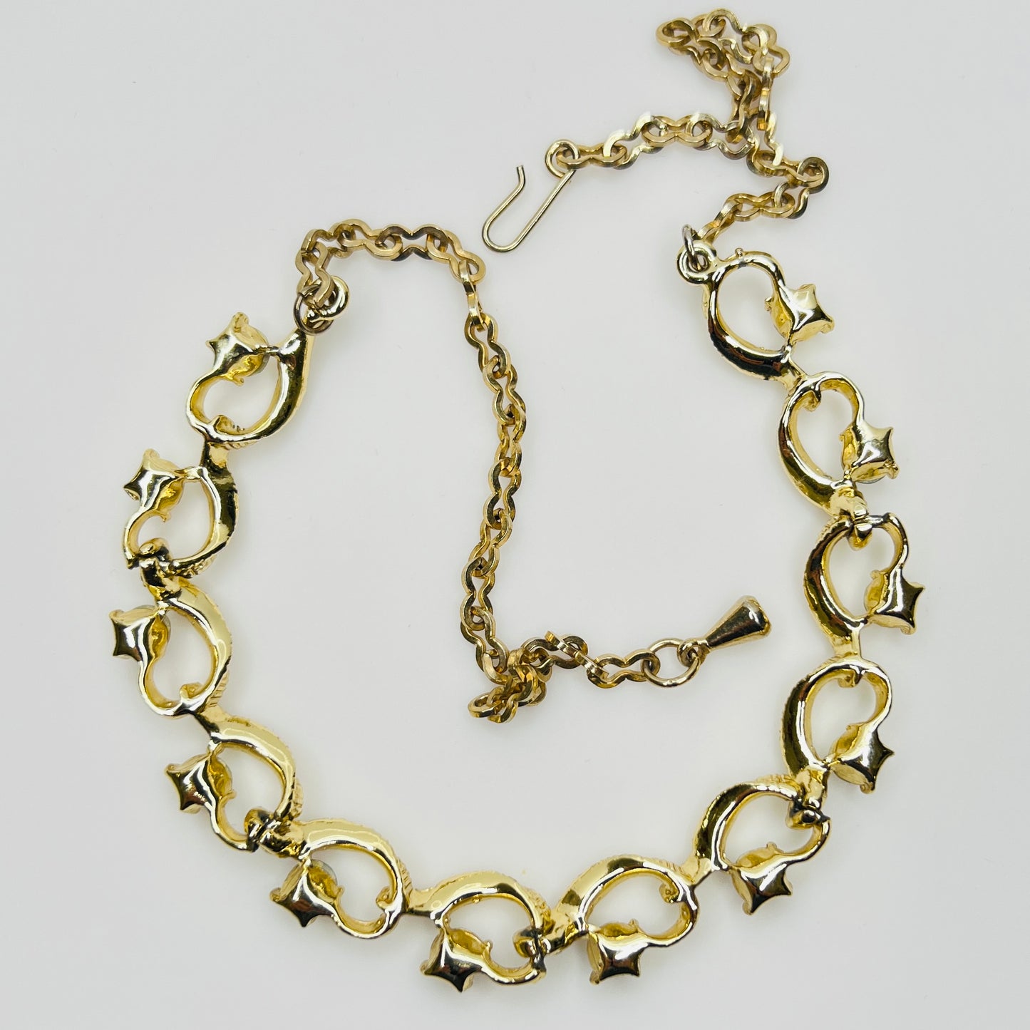 Back of gold-tone choker showing clasp and link structure