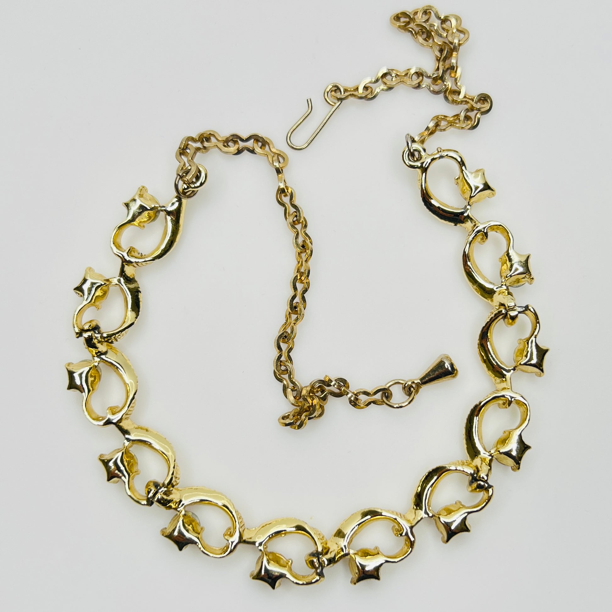 Back of gold-tone choker showing clasp and link structure