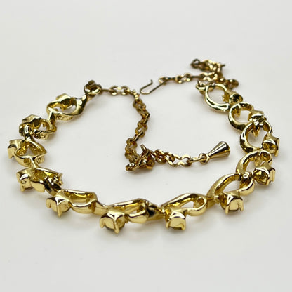 Back of gold-tone choker showing clasp and link structure