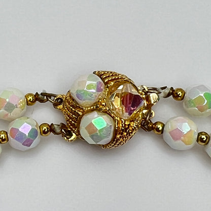 Close-up of ornate goldtone box clasp with coordinating bead accents