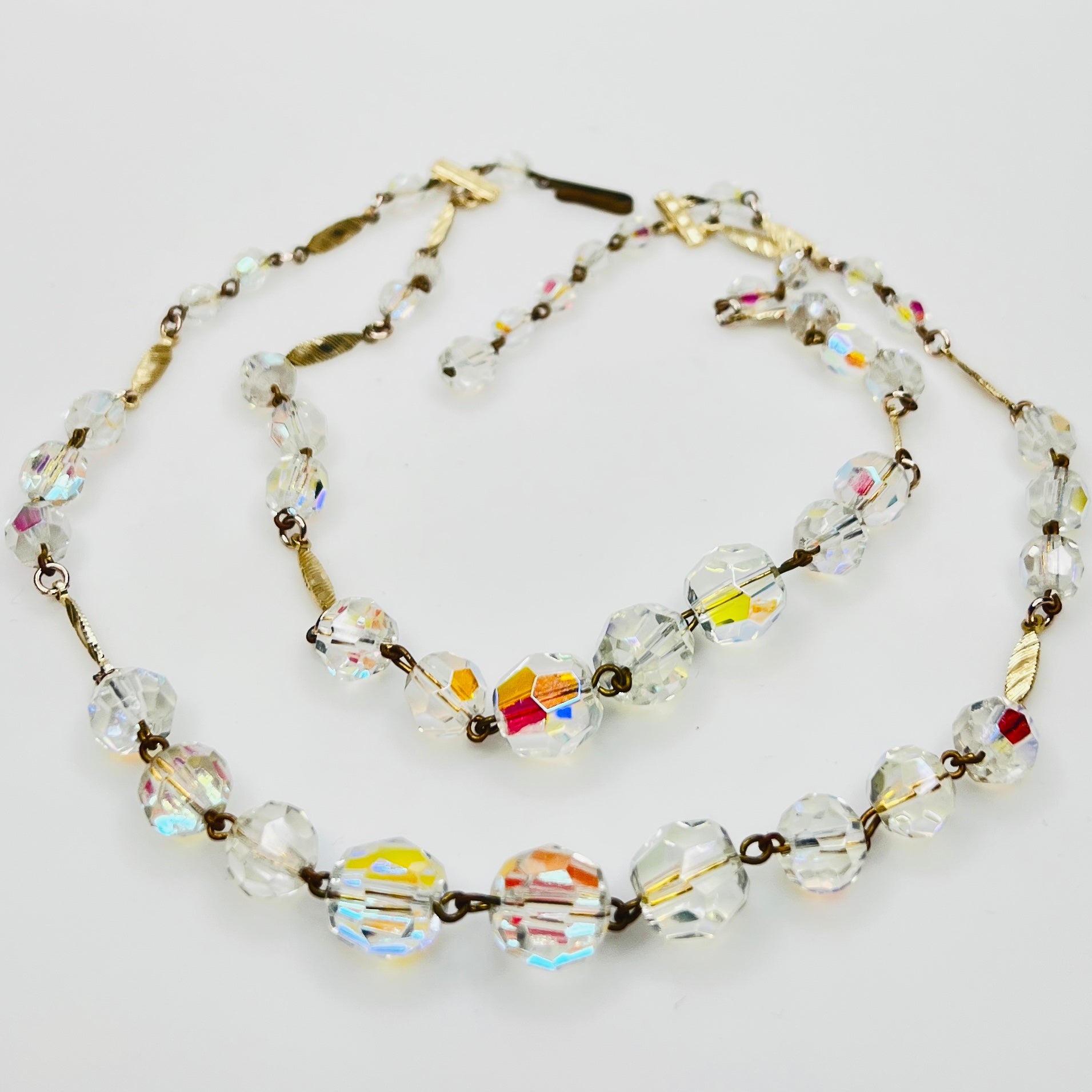 Graduated aurora borealis beads with iridescent finish
