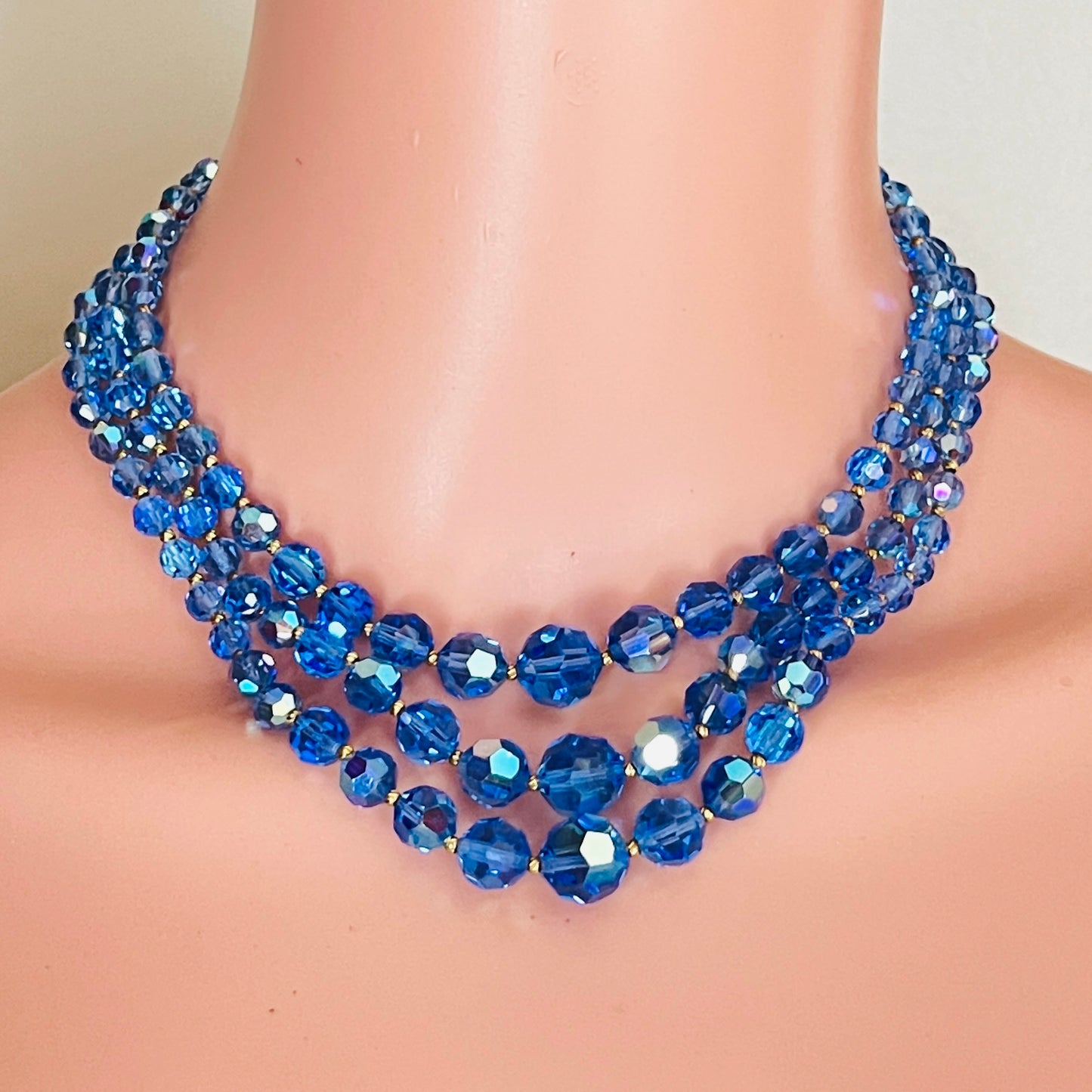 1950s triple strand blue aurora borealis crystal necklace worn on mannequin