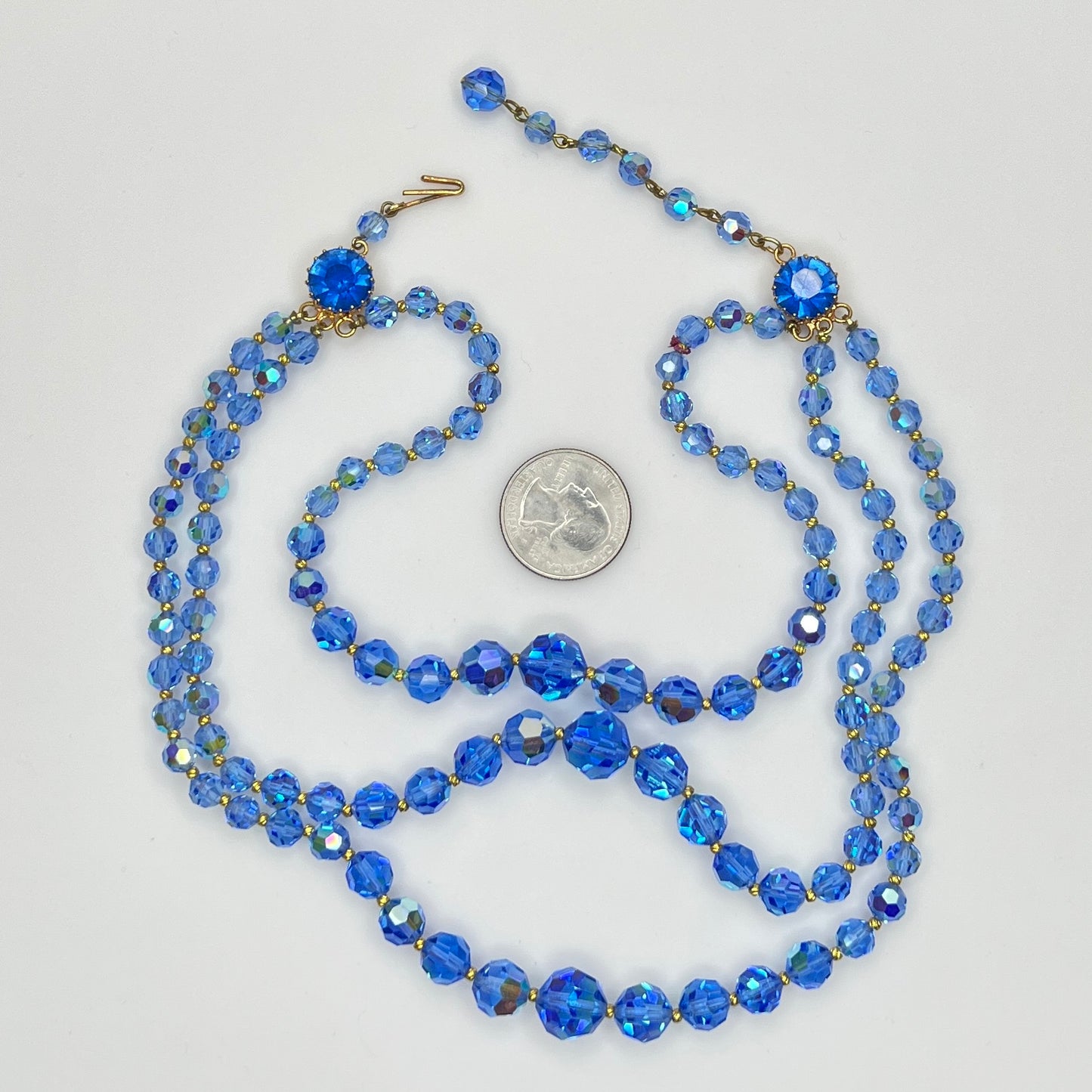 Faceted blue crystal bead necklace with jeweled hook clasp and extender