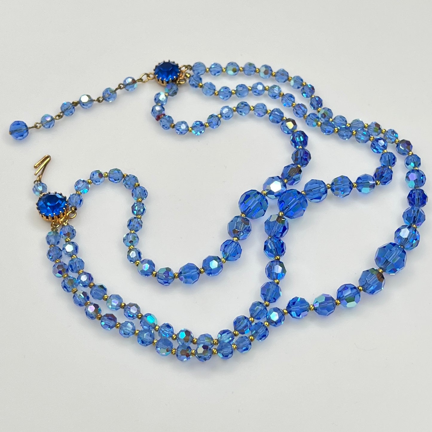 Faceted blue crystal bead necklace with jeweled hook clasp and extender