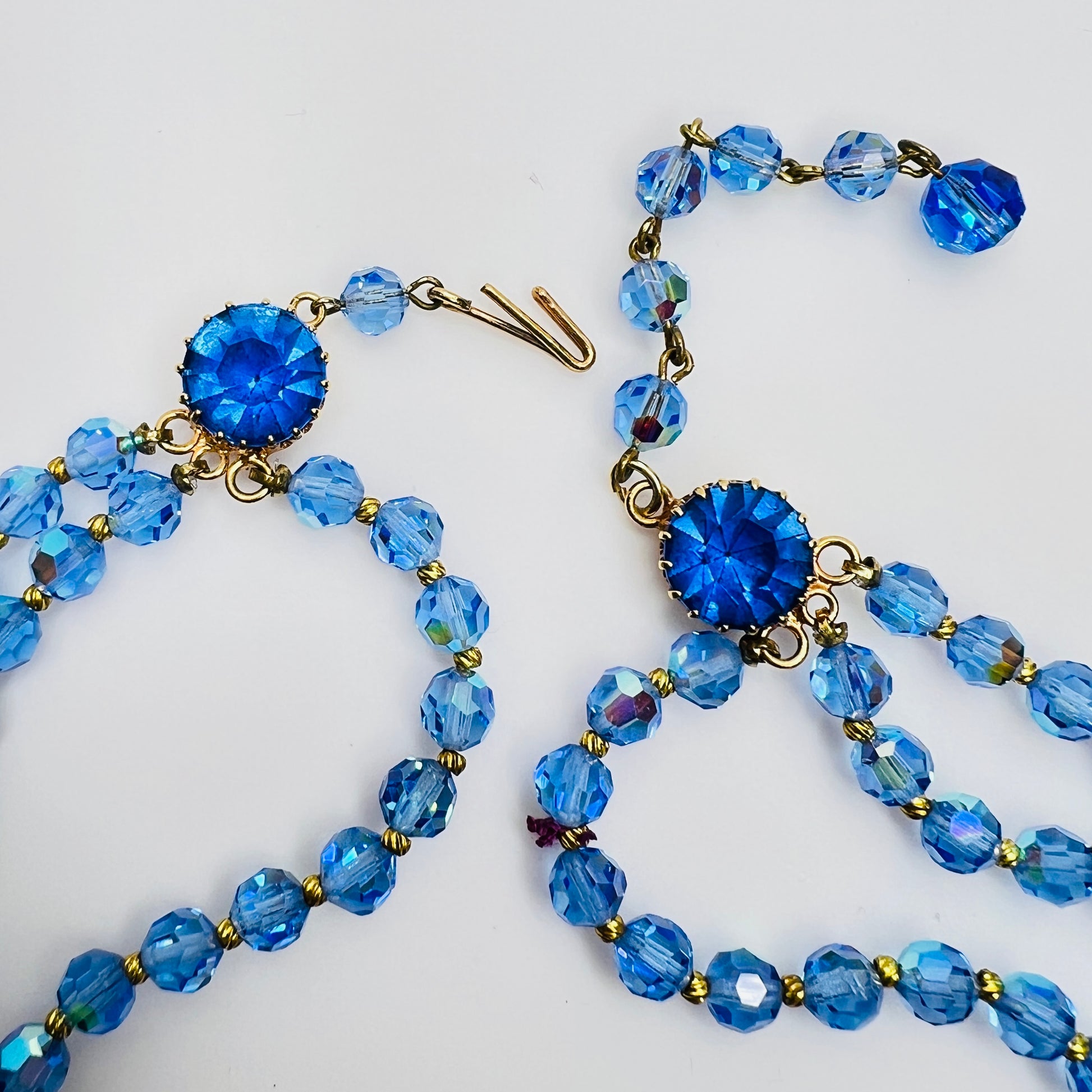 Faceted blue crystal bead necklace with jeweled hook clasp and extender