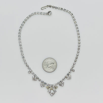 Necklace laid flat showing hook clasp and rhinestone extender
